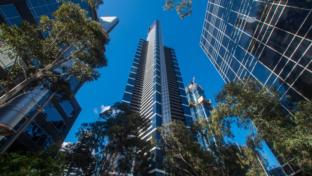 Eureka tower and other buildings in a park in Melbourne CBD